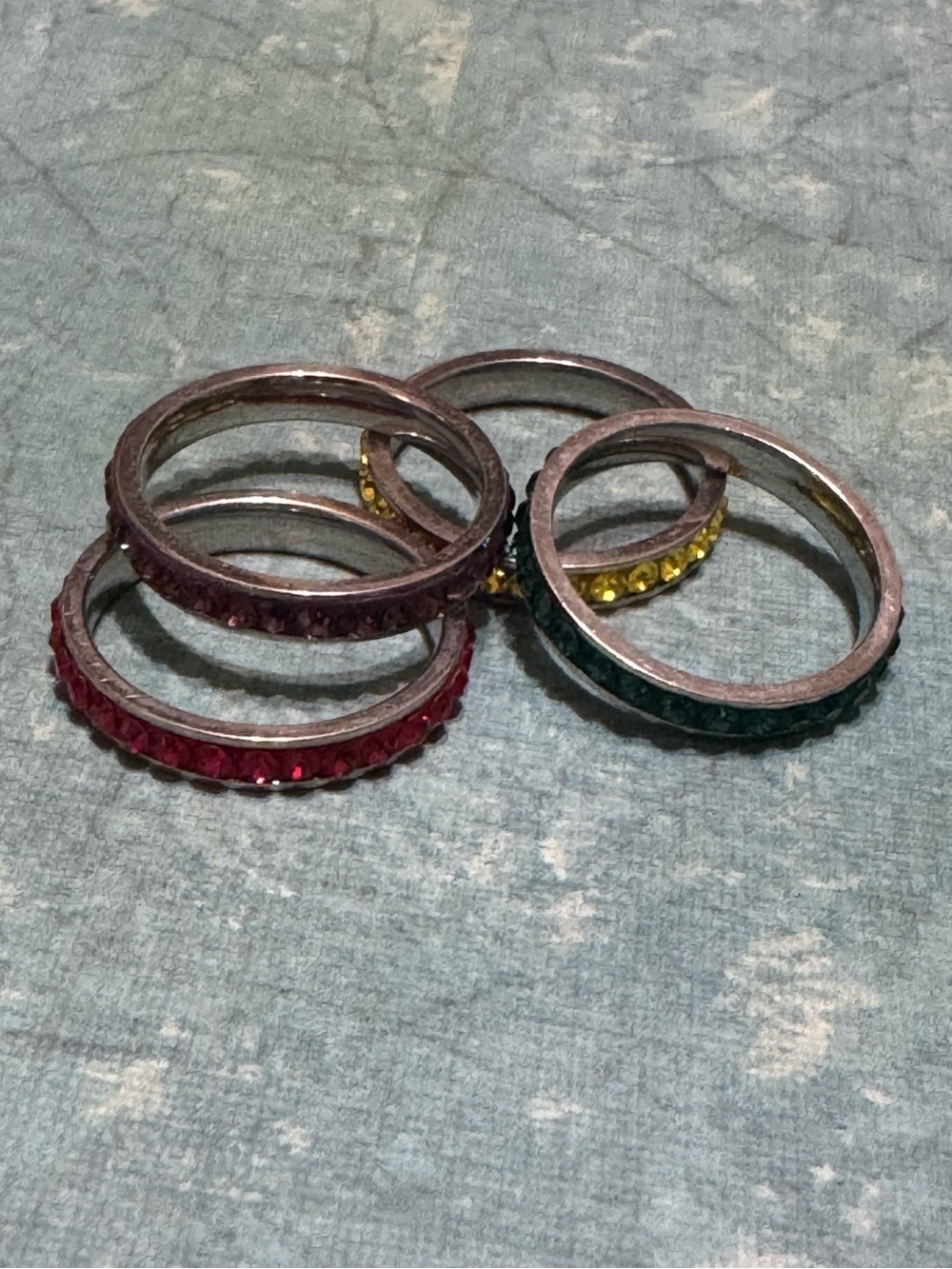 SET OF FOUR STACKABLE STAINLESS STEEL RINGS
